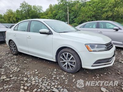 Czwarte zdjęcie samochodu z boku: 2017 VOLKSWAGEN JETTA SE VIN:3VWDB7AJ1HM368656 - miniatura