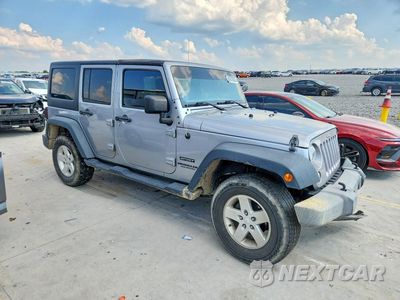 Czwarte zdjęcie samochodu z boku: 2017 JEEP WRANGLER UNLIMITED SPORT VIN:1C4HJWDG2HL674137 - miniatura