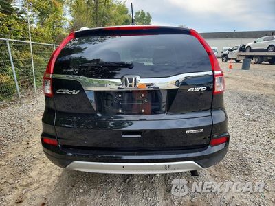 Zdjęcie 6 z 13 samochodu: 2016 HONDA CR-V TOURING VIN:5J6RM4H96GL021671 - miniatura