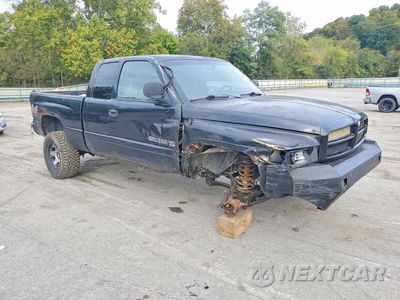 Czwarte zdjęcie samochodu z boku: 2000 DODGE RAM 1500 VIN:3B7HF13Z1YG160820 - miniatura
