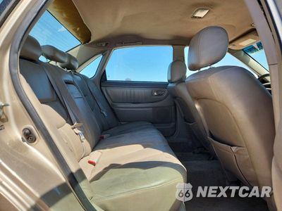 Zdjęcie 10 z 12 samochodu: 2004 TOYOTA AVALON XLS VIN:4T1BF28BX4U381388 - miniatura