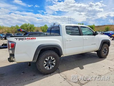 Trzecie zdjęcie samochodu z tyłu: 2021 TOYOTA TACOMA TRD OFF-ROAD VIN:3TMCZ5ANXMM435492 - miniatura