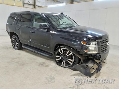 Czwarte zdjęcie samochodu z boku: 2019 CHEVROLET TAHOE C1500 PREMIER VIN:1GNSCCKJ4KR105346 - miniatura