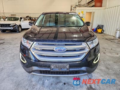 Piąte zdjęcie samochodu w środku: 2017 FORD EDGE TITANIUM VIN:2FMPK4K96HBB11914 - miniatura
