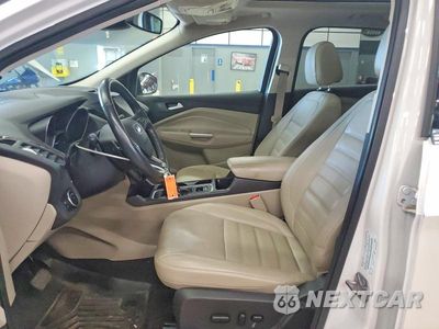 Zdjęcie 7 z 13 samochodu: 2017 FORD ESCAPE TITANIUM VIN:1FMCU9JD8HUA35439 - miniatura