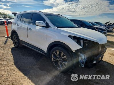 Czwarte zdjęcie samochodu z boku: 2017 HYUNDAI SANTA FE SPORT 2.0T ULTIMATE VIN:5NMZWDLA4HH042197 - miniatura
