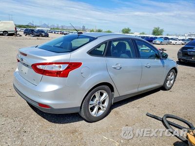 Trzecie zdjęcie samochodu z tyłu: 2014 FORD FOCUS SE VIN:1FADP3F24EL272487 - miniatura