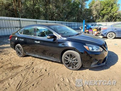 Czwarte zdjęcie samochodu z boku: 2018 NISSAN SENTRA SR VIN:3N1AB7AP9JY275282 - miniatura