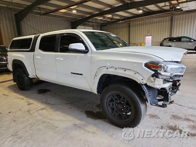 Czwarte zdjęcie samochodu z boku: 2019 TOYOTA TACOMA TRD OFF-ROAD VIN:3TMDZ5BN0KM065430 - miniatura