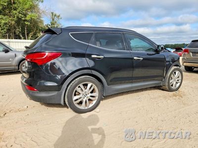 Trzecie zdjęcie samochodu z tyłu: 2014 HYUNDAI SANTA FE SPORT 2.0T VIN:5XYZW3LAXEG231789 - miniatura