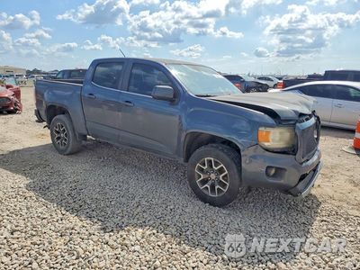 Czwarte zdjęcie samochodu z boku: 2015 GMC CANYON SLE VIN:1GTG5BE38F1180846 - miniatura