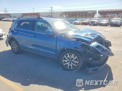 Czwarte zdjęcie samochodu z boku: 2019 VOLKSWAGEN TIGUAN SE VIN:3VV3B7AX0KM014056 - miniatura