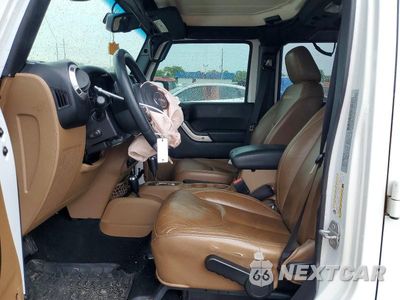 Zdjęcie 7 z 12 samochodu: 2015 JEEP WRANGLER UNLIMITED SAHARA VIN:1C4BJWEG5FL722781 - miniatura