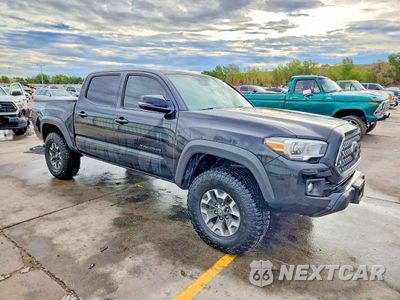 Czwarte zdjęcie samochodu z boku: 2018 TOYOTA TACOMA TRD OFF-ROAD VIN:5TFCZ5AN3JX139090 - miniatura