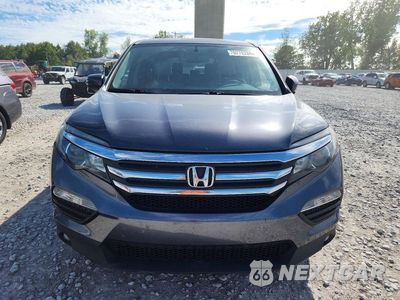 Piąte zdjęcie samochodu w środku: 2016 HONDA PILOT EXL VIN:5FNYF6H58GB108804 - miniatura