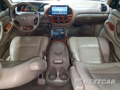 Zdjęcie 8 z 13 samochodu: 2004 TOYOTA TUNDRA LIMITED VIN:5TBDT48104S461966 - miniatura