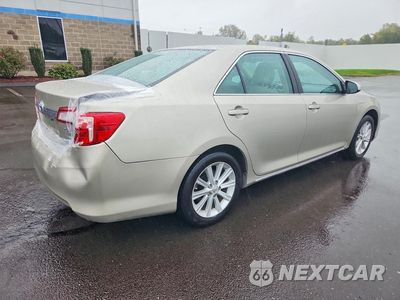 Trzecie zdjęcie samochodu z tyłu: 2014 TOYOTA CAMRY HYBRID XLE VIN:4T1BD1FK3EU098853 - miniatura