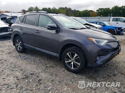 Czwarte zdjęcie samochodu z boku: 2018 TOYOTA RAV4 XLE VIN:2T3RFREV9JW807175 - miniatura