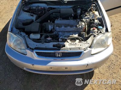 Zdjęcie 11 z 12 samochodu: 1998 HONDA CIVIC LX VIN:2HGEJ6674WH613996 - miniatura