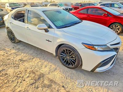 Czwarte zdjęcie samochodu z boku: 2022 TOYOTA CAMRY XSE VIN:4T1K61AK1NU027703 - miniatura