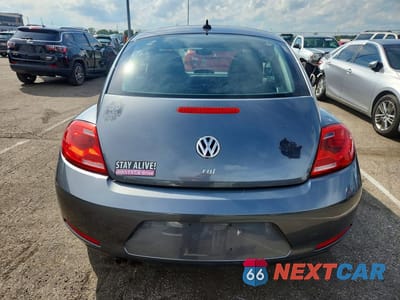 Zdjęcie 6 z 12 samochodu: 2014 VOLKSWAGEN BEETLE VIN:3VWJL7AT7EM647400 - miniatura