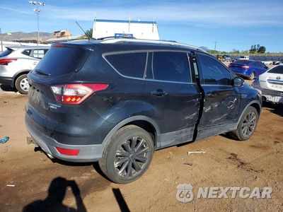 Trzecie zdjęcie samochodu z tyłu: 2017 FORD ESCAPE TITANIUM VIN:1FMCU9J99HUE91249 - miniatura