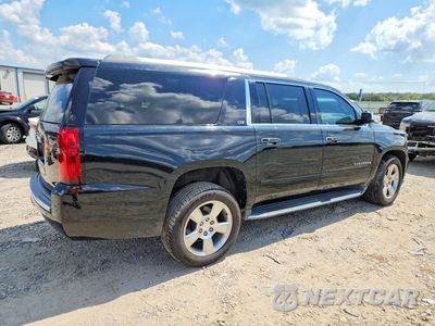 Trzecie zdjęcie samochodu z tyłu: 2016 CHEVROLET SUBURBAN C1500 LTZ VIN:1GNSCJKC0GR216828 - miniatura