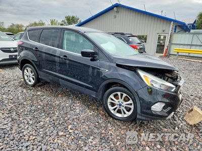Czwarte zdjęcie samochodu z boku: 2017 FORD ESCAPE SE VIN:1FMCU0GD9HUA59445 - miniatura