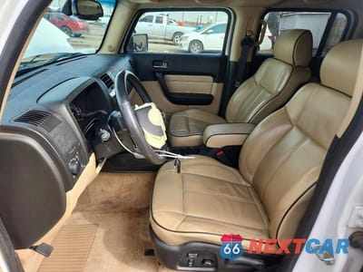 Zdjęcie 7 z 13 samochodu: 2006 HUMMER H3 VIN:5GTDN136968232852 - miniatura
