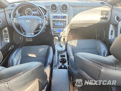 Zdjęcie 8 z 12 samochodu: 2007 HYUNDAI TIBURON GT VIN:KMHHN66F77U250465 - miniatura