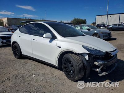 Czwarte zdjęcie samochodu z boku: 2022 TESLA MODEL Y VIN:7SAYGDEE1NF437737 - miniatura