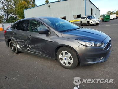 Czwarte zdjęcie samochodu z boku: 2018 FORD FOCUS S VIN:1FADP3E24JL274784 - miniatura