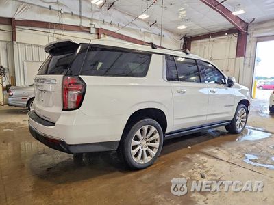 Trzecie zdjęcie samochodu z tyłu: 2021 CHEVROLET SUBURBAN K1500 PREMIER VIN:1GNSKFKT4MR342198 - miniatura