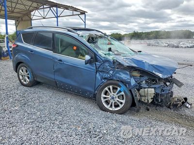Czwarte zdjęcie samochodu z boku: 2018 FORD ESCAPE SEL VIN:1FMCU0HD5JUC64782 - miniatura