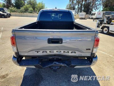 Zdjęcie 6 z 12 samochodu: 2021 TOYOTA TACOMA TRD SPORT VIN:3TMDZ5BN1MM100754 - miniatura