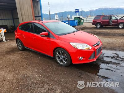 Czwarte zdjęcie samochodu z boku: 2014 FORD FOCUS SE VIN:1FADP3K28EL113123 - miniatura