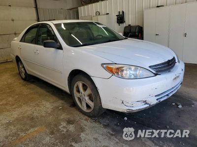 Czwarte zdjęcie samochodu z boku: 2002 TOYOTA CAMRY SE VIN:JTDBE32K820053705 - miniatura