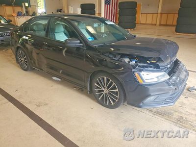 Czwarte zdjęcie samochodu z boku: 2016 VOLKSWAGEN JETTA SPORT VIN:3VWD17AJ3GM406647 - miniatura