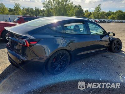 Trzecie zdjęcie samochodu z tyłu: 2024 TESLA MODEL 3 VIN:5YJ3E1ET2RF820232 - miniatura