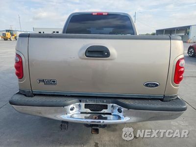 Zdjęcie 6 z 13 samochodu: 2002 FORD F150 SUPERCREW VIN:1FTRW076X2KE38449 - miniatura