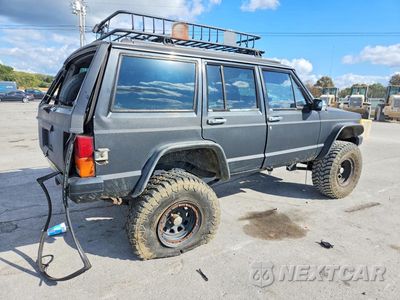 Trzecie zdjęcie samochodu z tyłu: 1992 JEEP CHEROKEE LAREDO VIN:1J4FJ58S2NL234411 - miniatura