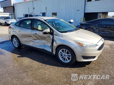Czwarte zdjęcie samochodu z boku: 2017 FORD FOCUS SE VIN:1FADP3F23HL212575 - miniatura