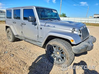 Czwarte zdjęcie samochodu z boku: 2014 JEEP WRANGLER UNLIMITED SAHARA VIN:1C4BJWEG0EL168161 - miniatura