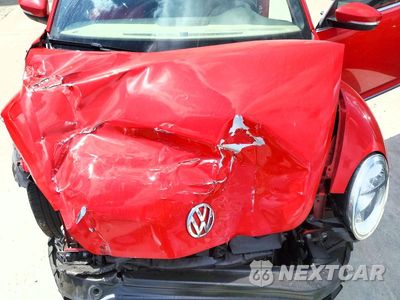 Zdjęcie 11 z 12 samochodu: 2013 VOLKSWAGEN BEETLE VIN:3VW5P7AT4DM813005 - miniatura