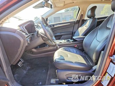 Zdjęcie 7 z 12 samochodu: 2016 FORD FUSION TITANIUM PHEV VIN:3FA6P0SU4GR405400 - miniatura