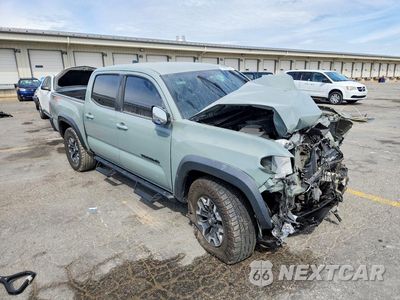 Czwarte zdjęcie samochodu z boku: 2022 TOYOTA TACOMA TRD OFF-ROAD VIN:3TMCZ5AN9NM532460 - miniatura