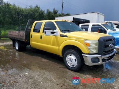 Czwarte zdjęcie samochodu z boku: 2011 FORD F350 SUPER DUTY DUMP TRUCK VIN:1FD8W3GT4BEB12689 - miniatura