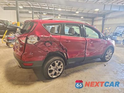 Trzecie zdjęcie samochodu z tyłu: 2014 FORD ESCAPE TITANIUM VIN:1FMCU9J92EUC77652 - miniatura