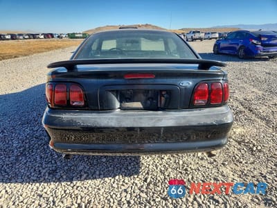 Zdjęcie 6 z 12 samochodu: 1998 FORD MUSTANG GT VIN:1FAFP42X7WF195663 - miniatura