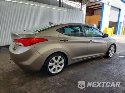 Trzecie zdjęcie samochodu z tyłu: 2013 HYUNDAI ELANTRA LIMITED VIN:5NPDH4AE4DH438430 - miniatura